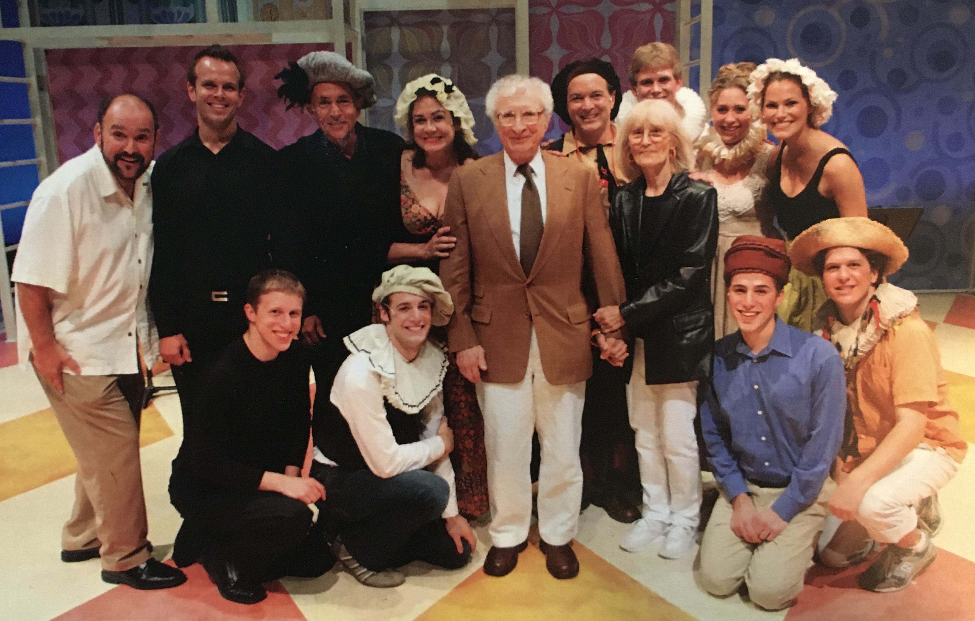 Sheldon Harnick and young students in costume