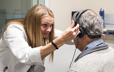 audiologist conducting exam