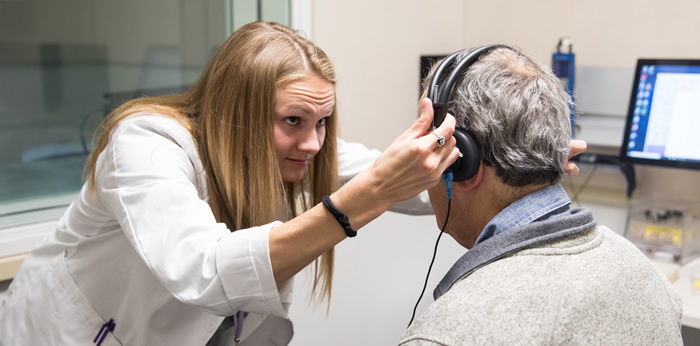 audiologist conducting an exam