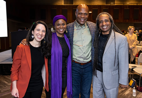 Group photo of Adriana Weisleder, Cristal Chanelle Truscott, E. Patrick Johnson, and Marco Williams posing for photo together.